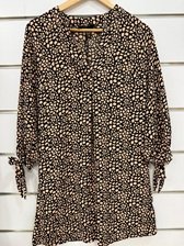 Elegant Brown Women’s Blouse with Modern Print and Long Sleeves